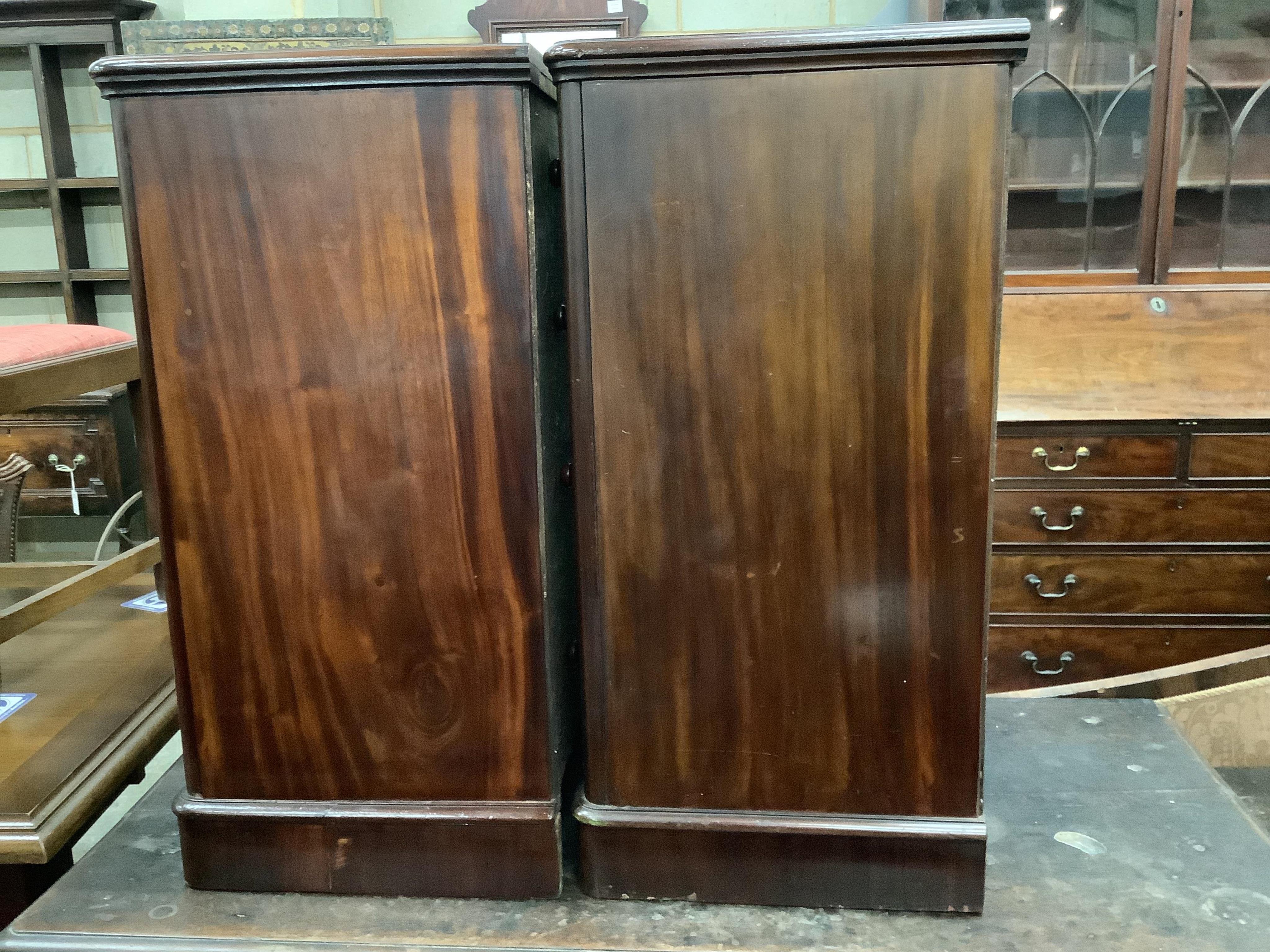 A pair of Victorian and later mahogany four drawer bedside chests, adapted, width 42cm, depth 40cm, height 81cm. Condition - good.